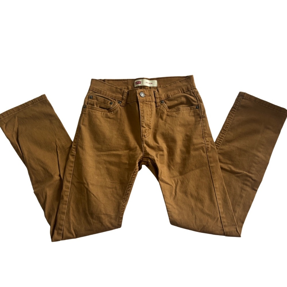 Levi’s 511 slim tan skinny jeans. They are a women’s 27 best fit a 25” waist.